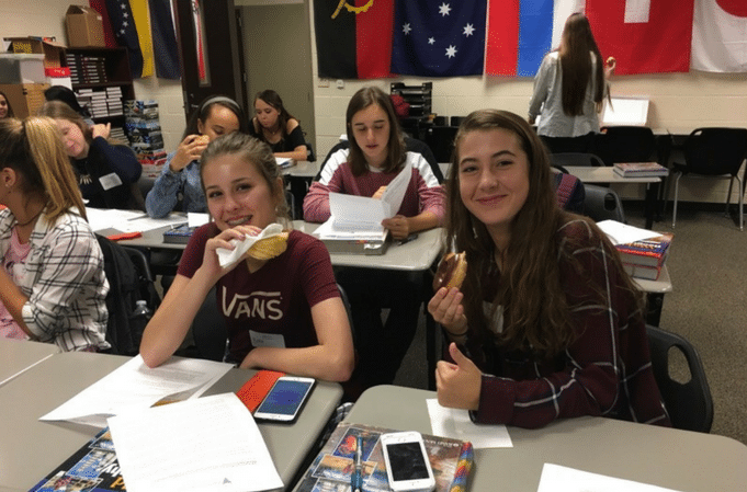 Students Eating Donuts